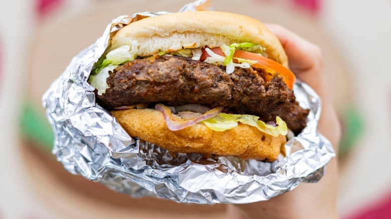 A foil-wrapped burger from Stamps Super Burgers in Mississippi