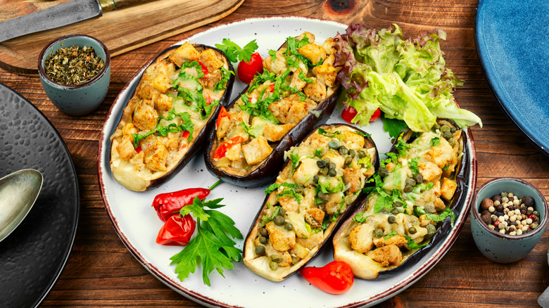 baked stuffed eggplants with meat, cheese and capers.