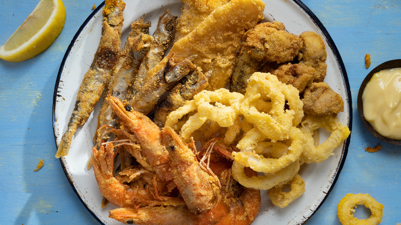 Plate of rustic fritto misto - mixed fried seafood
