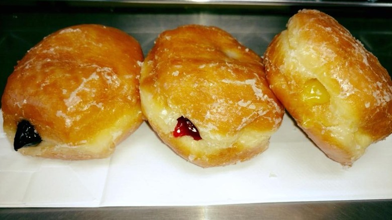 Three glazed filled donuts
