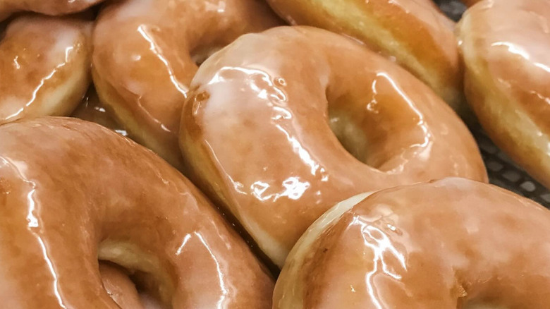 Pile of freshly glazed donuts