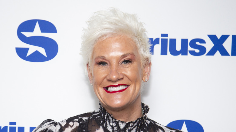 Anne Burrell on the red carpet smiling
