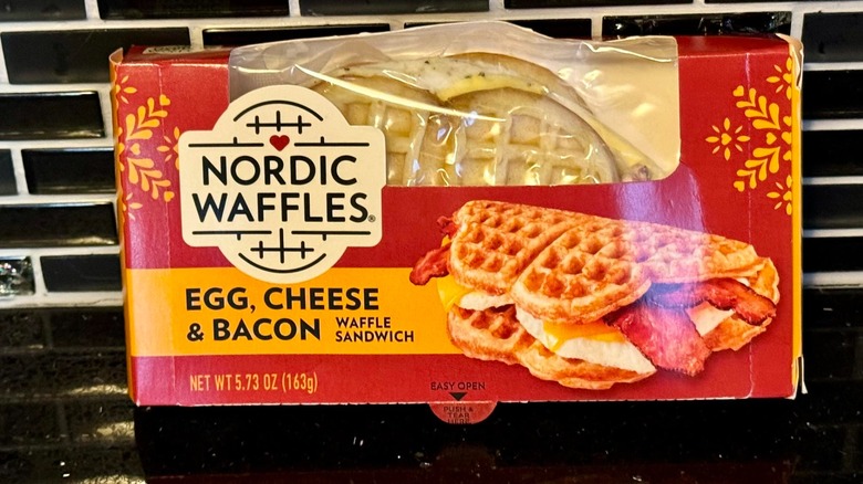 a red box of nordic waffles against black tile