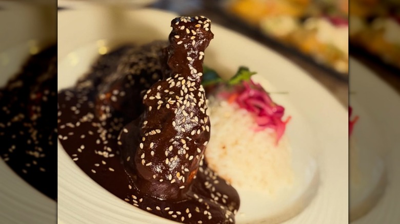 Mole poured over chicken from Cantina Los Mayas in California