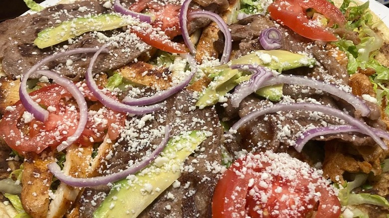 A plate of food from Salsa Oaxaqueñas in Alaska