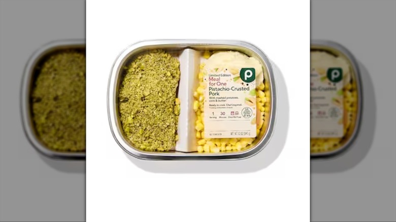 individual meal with pork, potatoes, and corn