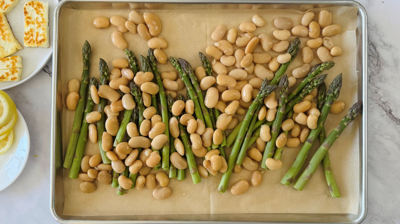 asparagus and butter beans in a sheet pan