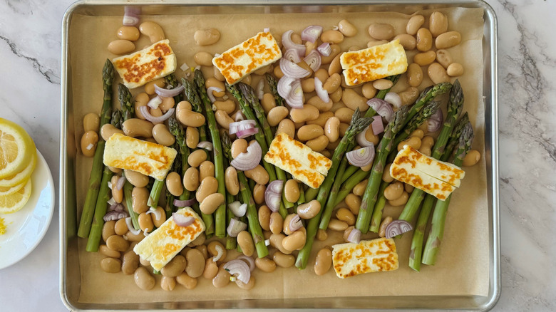 asparagus, beans, and cheese in a sheet pan