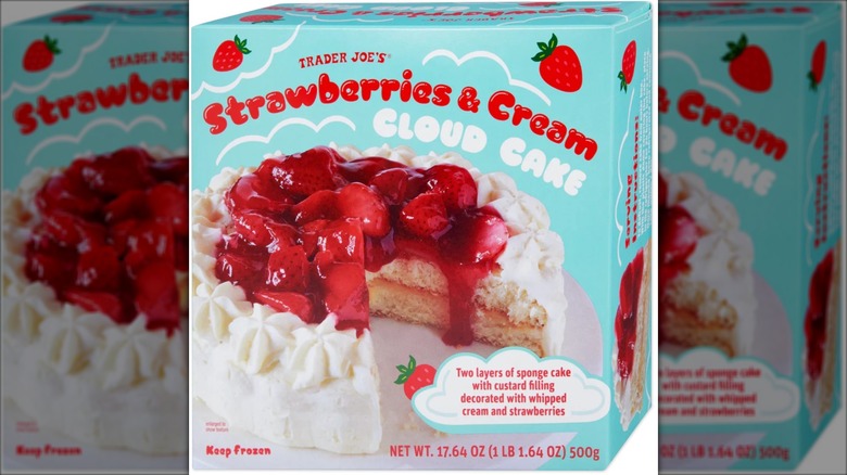 strawberry topped frozen cake in blue box