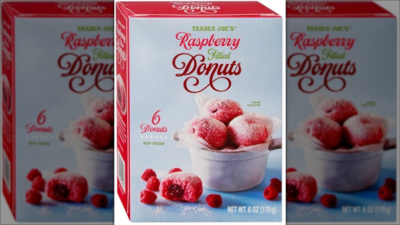 red and blue box of raspberry donuts