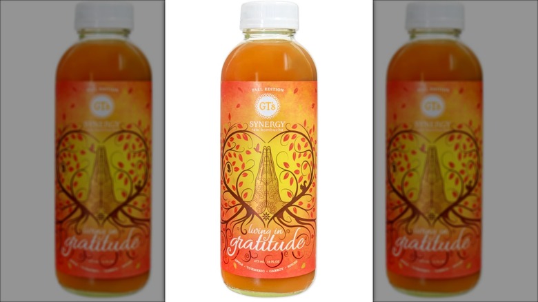 orange labeled bottle of kombucha