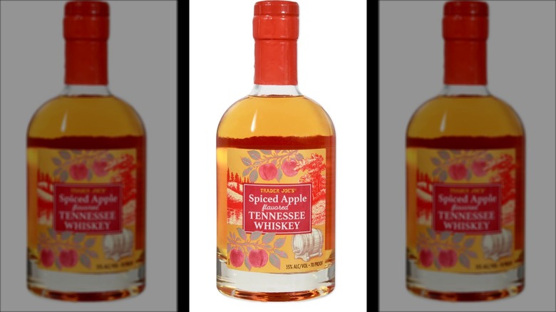 red capped bottle of apple whiskey