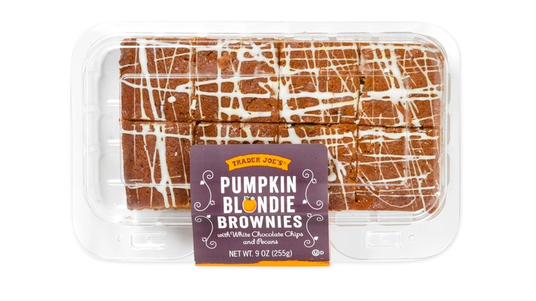 pumpkin brownies with white icing in packaging