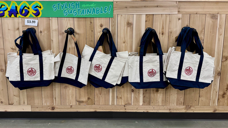 Display of Trader Joe's tote bags