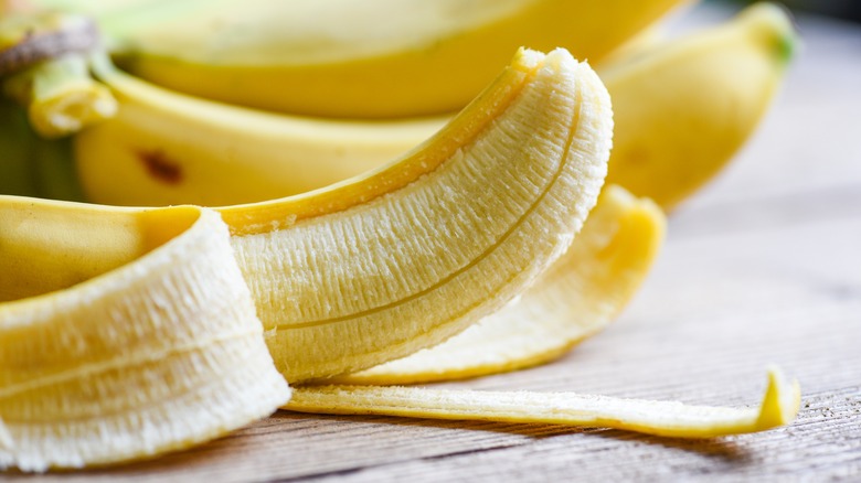 ripe banana mid-peel