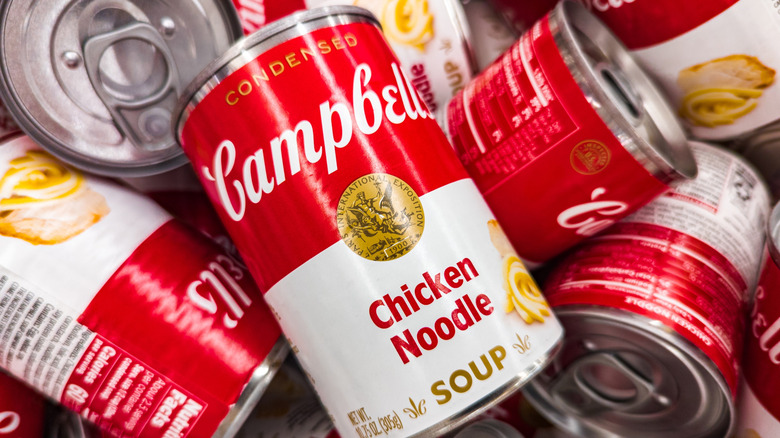 Pile of Campbell's chicken noodle soup cans