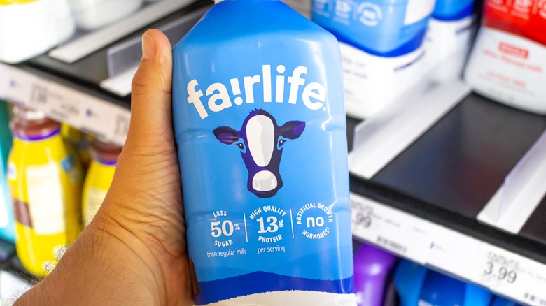 Person holding bottle of Fairlife milk