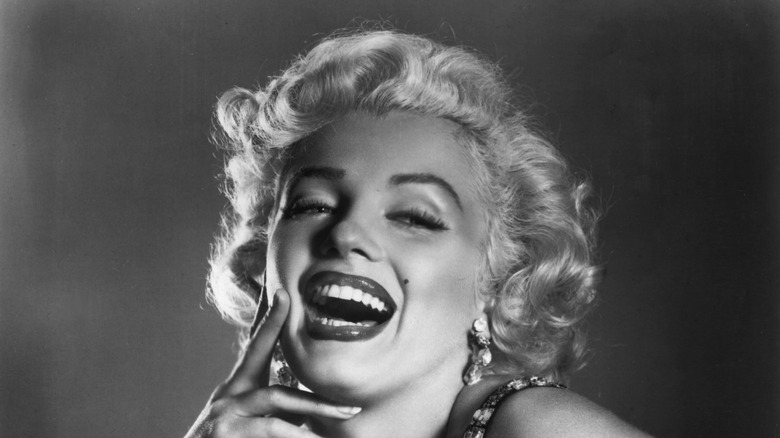 Marilyn Monroe laughing.