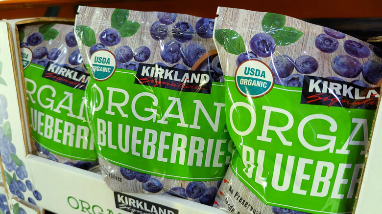 Packages of Kirkland Signature organic blueberries, closeup