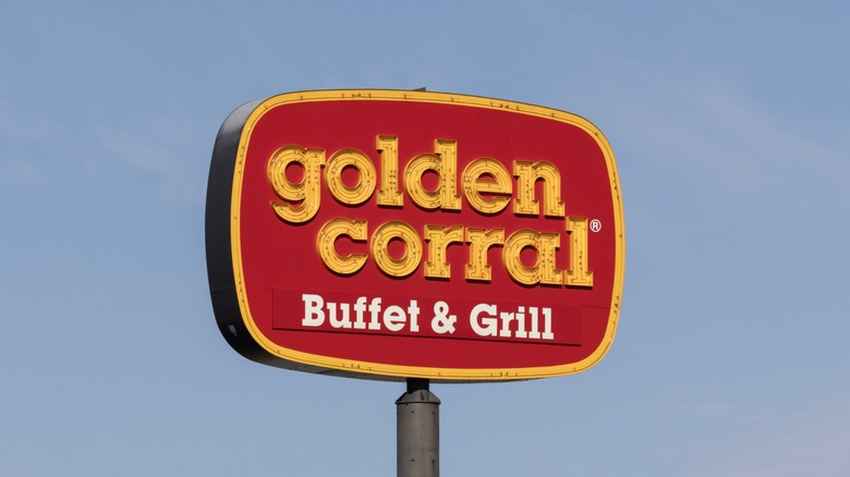 golden corral sign against blue sky