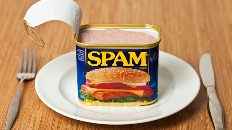 open can of spam with knife and fork