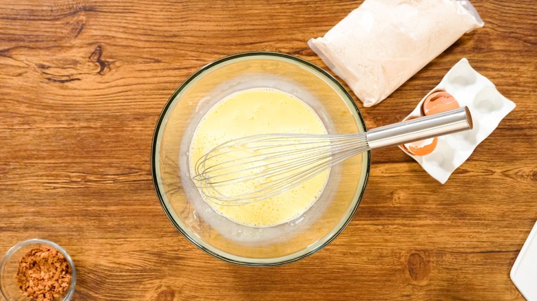 a bagged cake mix on a table with wet ingredients