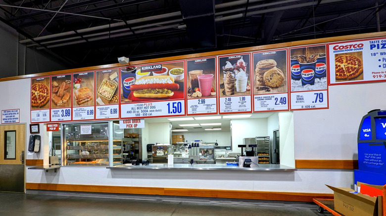 Costco food court interior with menu signs