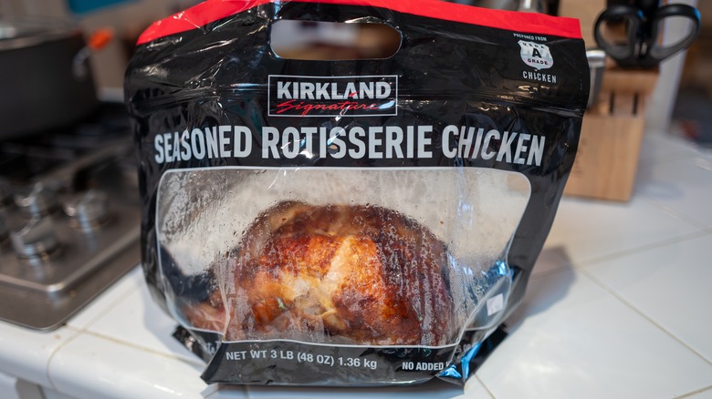Kirkland brand rotisserie chicken from Costco, in plastic food service bag
