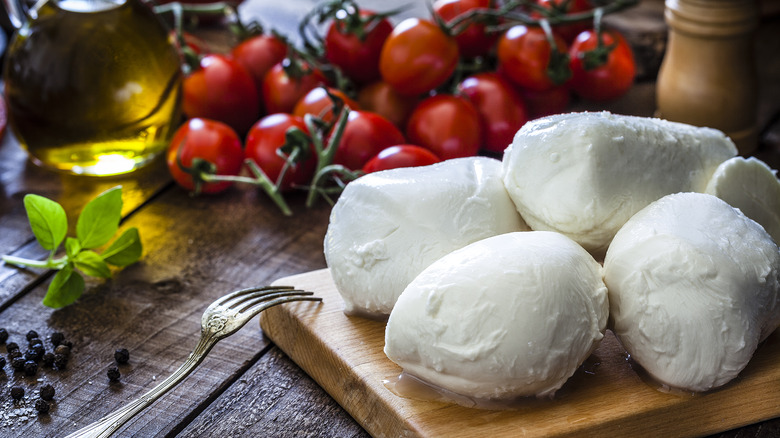 Burrata on pasta on a plate