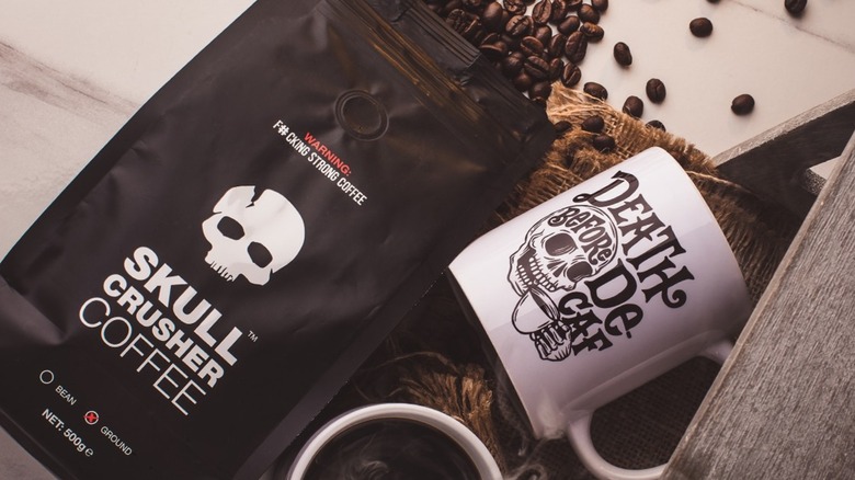 skull crusher coffee with branded mug and beans