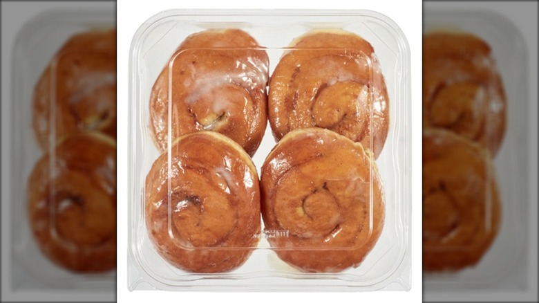 four pack of cinnamon glazed donuts in clamshell packaging