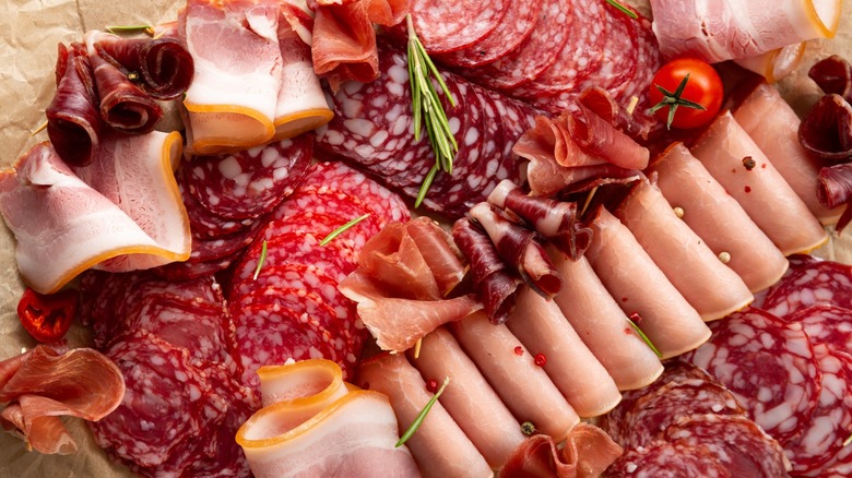 assortment of deli meats on board