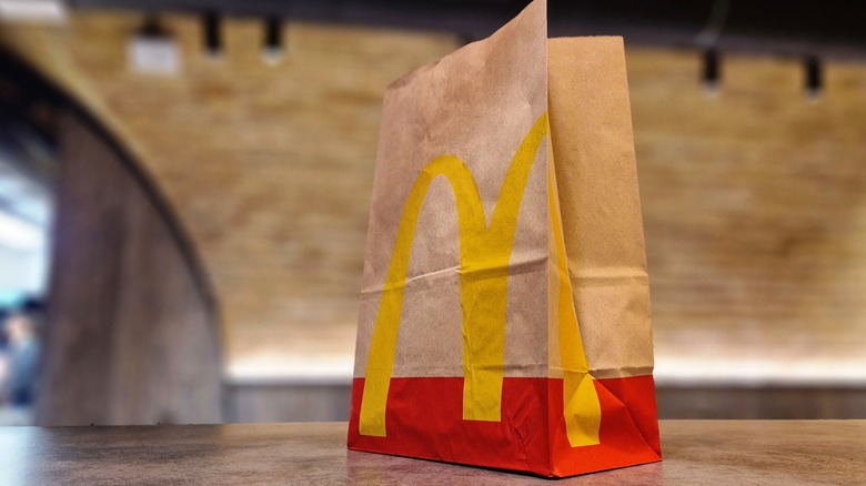 Paper take away bag from McDonald's on table