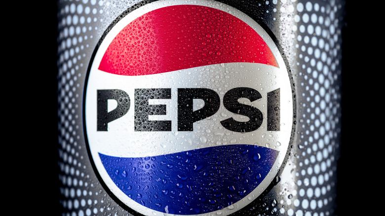 Close-up of Pepsi logo on can