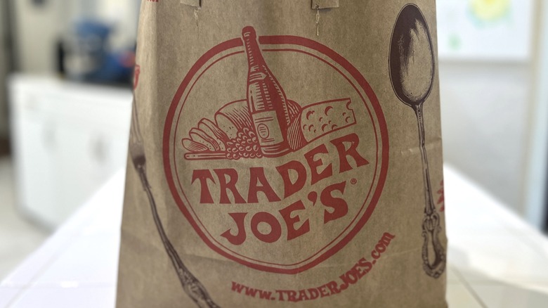 Trader Joe's paper grocery bag on a kitchen countertop