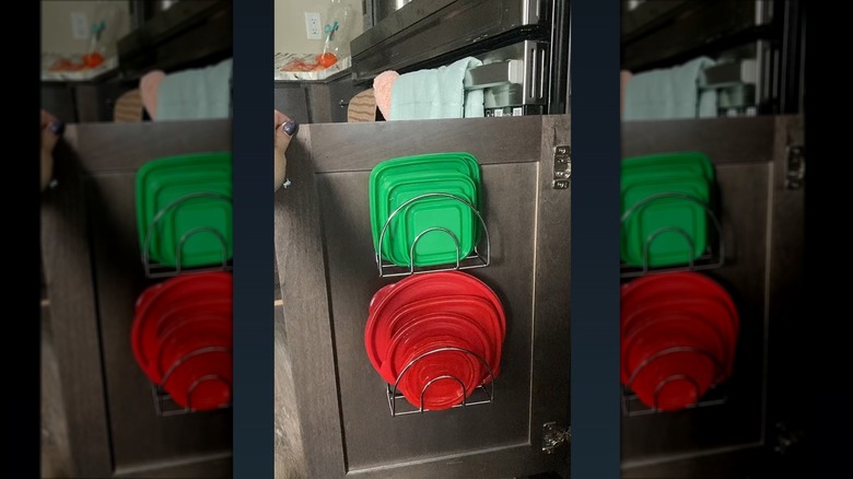 tupperware lids sorted with napkin holders on cabinets