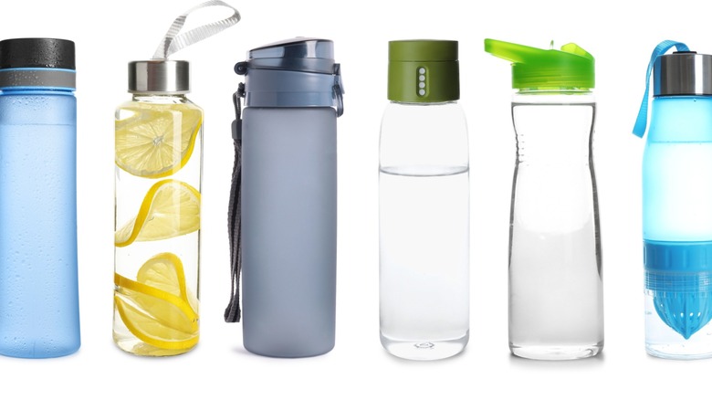 tall reusable water bottles against white background