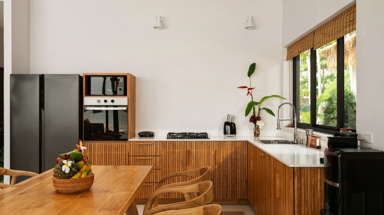 midcentury modern contemporary kitchen with wood tones