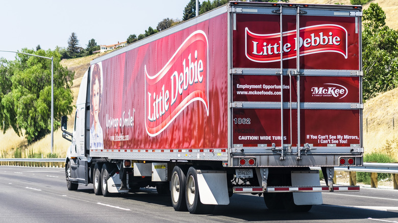 A Little Debbie truck drives down a highway
