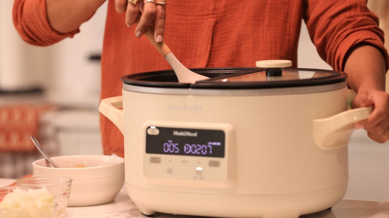 cooking with two-sided digital crock pot of the modern era