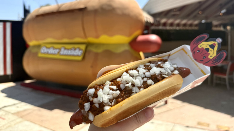 Chili dog in front of Tail O' the Pup