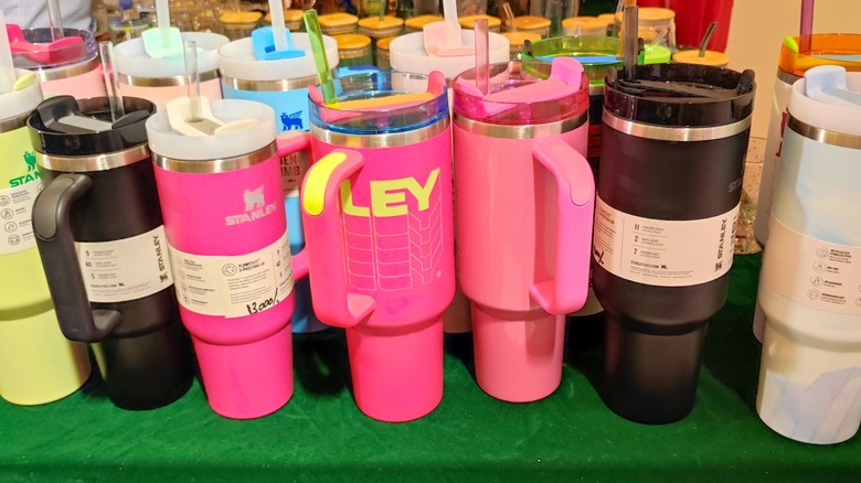 miscellaneous stanley tumblers on tabletop