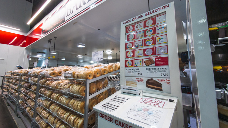 A custom cake ordering station at a Costco bakery