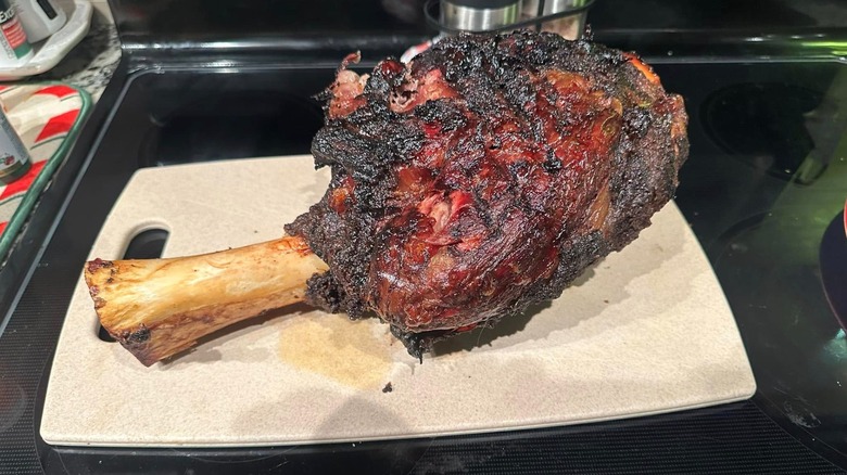 A "Thor's hammer" beef shank on a cutting board
