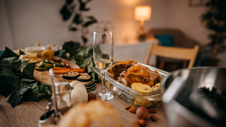 Leftover food and drink on table closeup