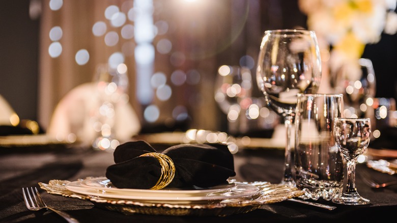 Fancy dinner setting with black napkin