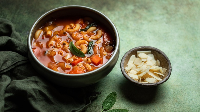 venus de milo soup in a small bowl with parmesan flakes