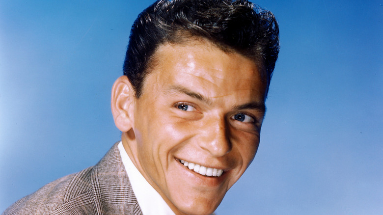 frank sinatra in color with blue background