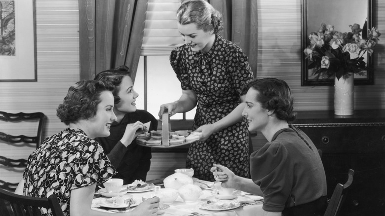 Vintage photo of ladies having tea.