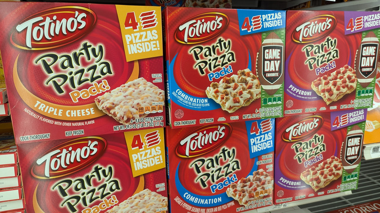 Totino's Party Pizza in a grocery store aisle.
